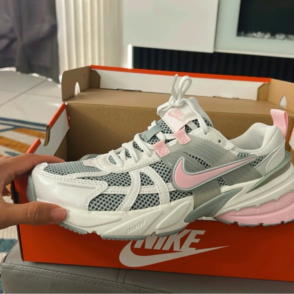 Nike White and Pink Athletic Shoes with Retro Design